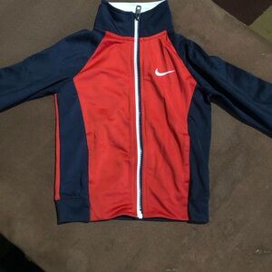 Red zip up Nike hoodie